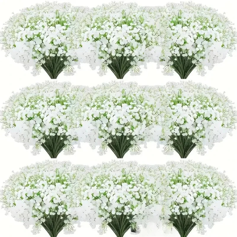A bouquet of white baby's breath flowers with green stems.
