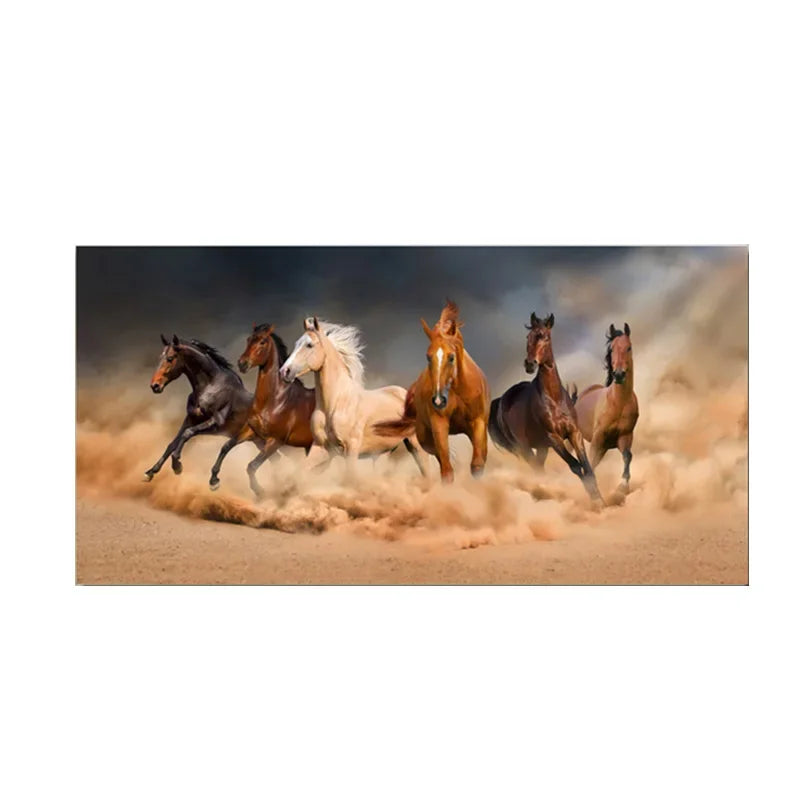 A group of horses galloping across a sandy field, kicking up dust in a dynamic motion.