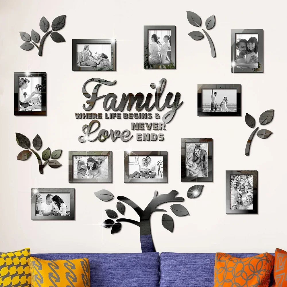 A wall collage featuring various framed photos and leaves arranged in a family tree design.