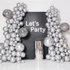 A silver metallic balloon garland arch kit featuring round and disco ball-like balloons displayed against a dark background.