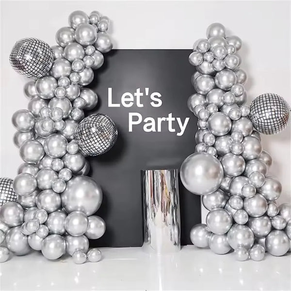 A silver metallic balloon garland arch kit featuring round and disco ball-like balloons displayed against a dark background.