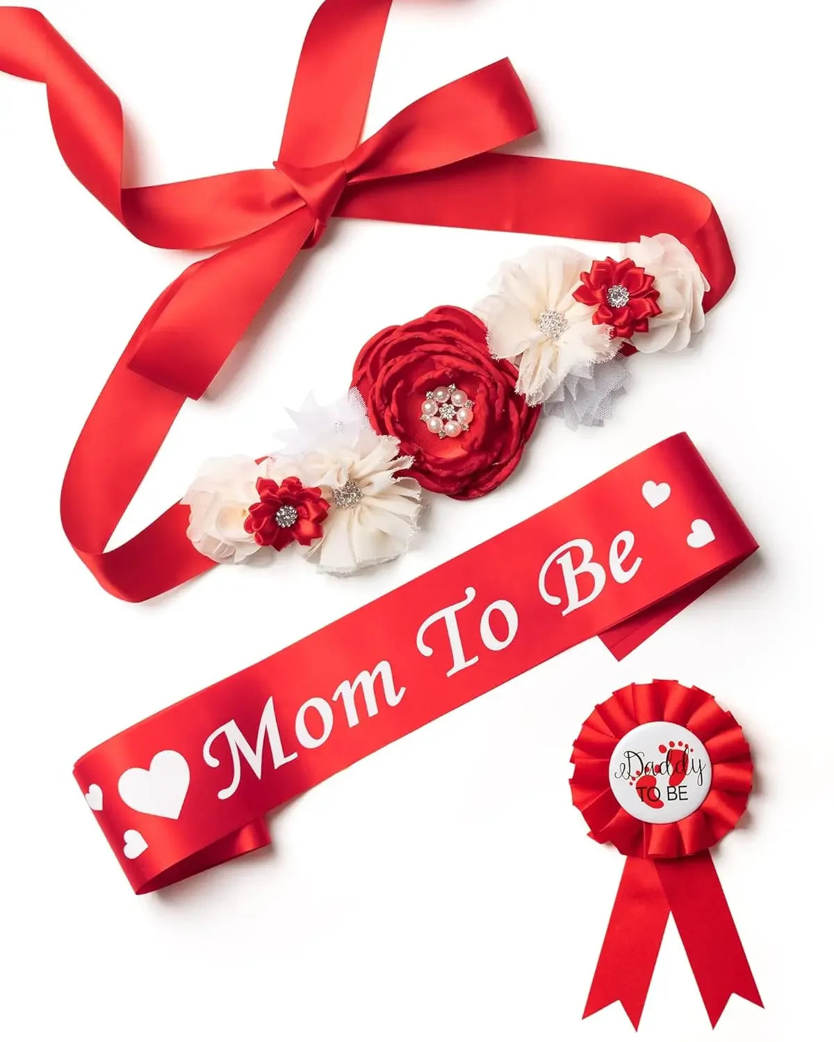 Red satin ribbon with white and red floral accents for a maternity sash and corsage pin set