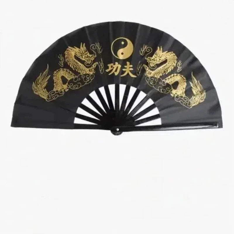 Black traditional bamboo folding fan decorated with gold dragons and a yin-yang symbol.