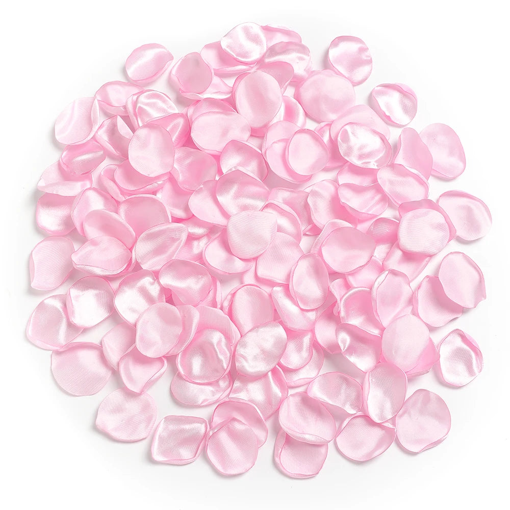 Pila de pétalos de flores artificiales de seda rosa para decoración del hogar y bodas.
