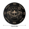 A black wooden divination board with celestial symbols and yes no maybe rephrase options around a central design.