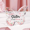Clear acrylic butterfly keepsake with pink floral designs and the message To my beautiful sister never forget I love you