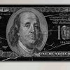 A black and white print of a 100 dollar Federal Reserve note featuring Benjamin Franklin.
