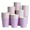A stack of purple disposable paper cups for parties and events.