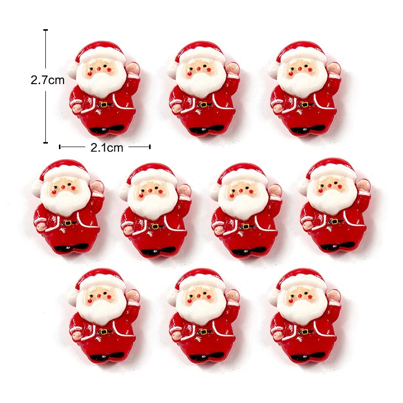 Un set de lindos imanes navideños para nevera con caras sonrientes de Santa en rojo y blanco.