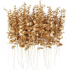 A bundle of dried gold artificial eucalyptus leaves used for home and event decoration.
