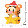 An orange and black tiger-themed building block model kit featuring a head and a yellow star.