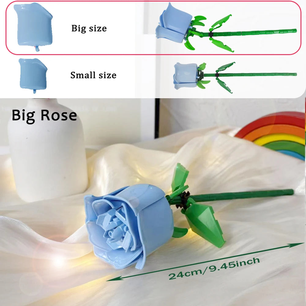 A light blue DIY rose flower building block with green stem and leaves, shown next to a white vase.