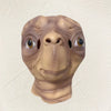 A realistic cute alien full-face latex mask with large eyes and textured skin.