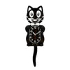 A black cartoon cat wall clock with a white bow and a swinging tail.