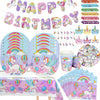 A collection of unicorn themed birthday party supplies including decorations, banners, and colorful items.