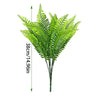 A vibrant green artificial Boston fern bush with long fronds shown vertically.
