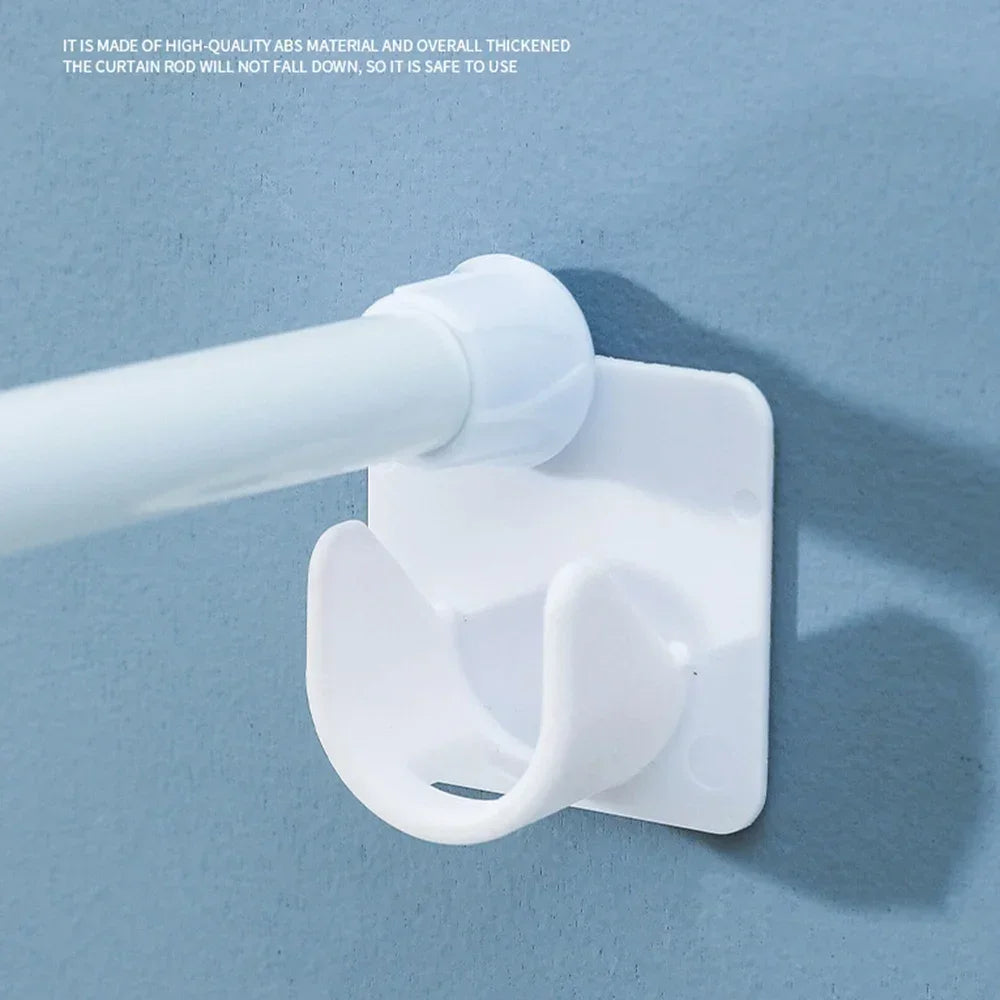 A white adjustable self-adhesive curtain rod bracket is shown mounted on a light blue wall.