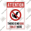A vintage warning metal sign with a red circle and diagonal line prohibiting dogs, stating There is no dog toilet here.