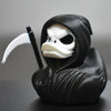 A black 3D printed statue of a Grim Reaper duck with a white scythe and hood.