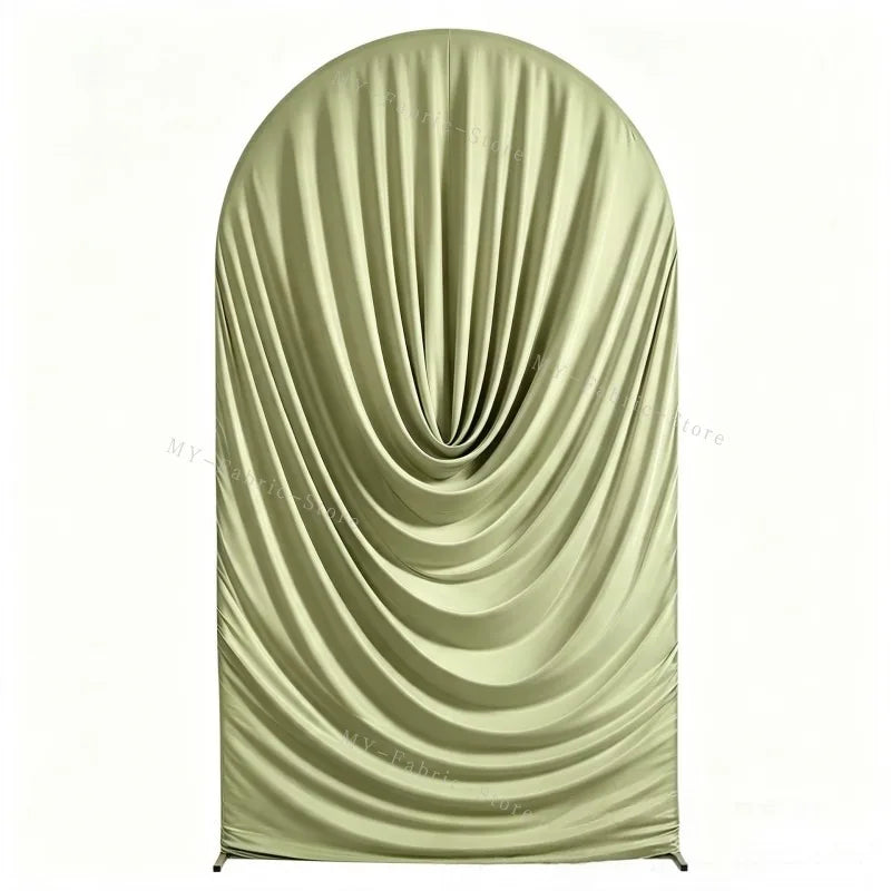 A draped, olive green spandex arch cover used for weddings and events.