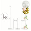 A silver acrylic balloon stand featuring a clear globe, gold balloons, and white floral arrangements.