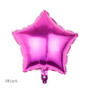 Un ballon en feuille rose brillant en forme d'étoile.
