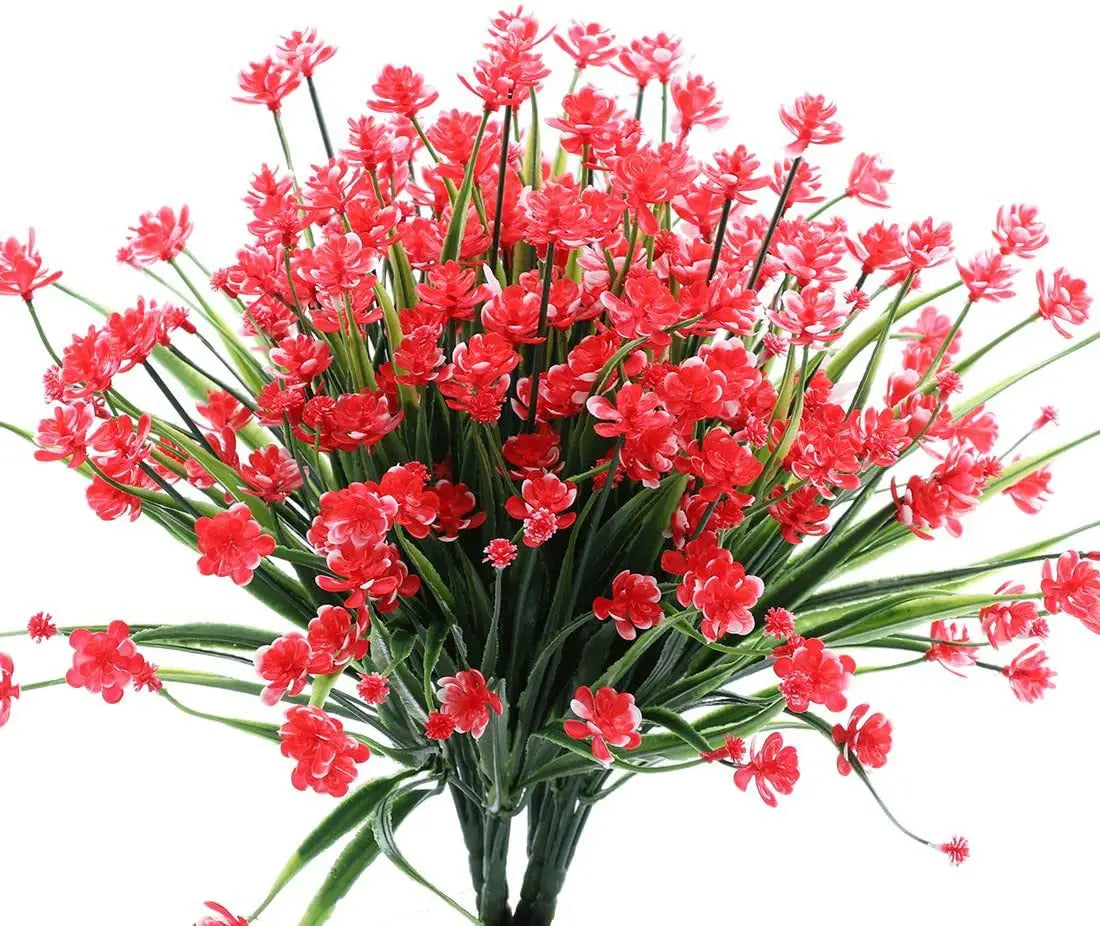 A bundle of bright red artificial flowers used for home and event decoration.