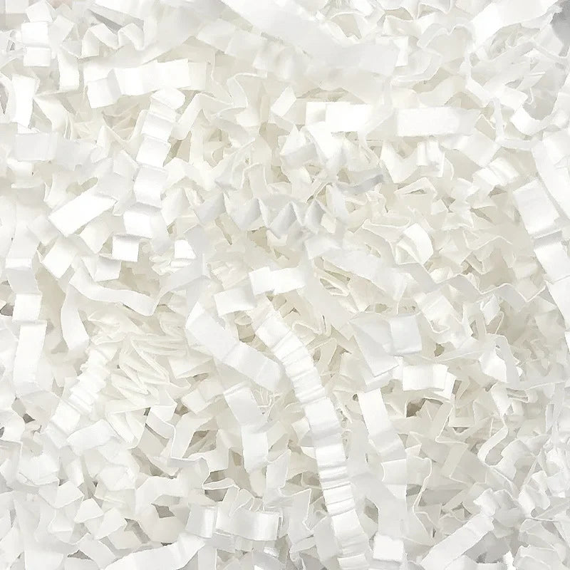 White crinkle cut paper shred filler material