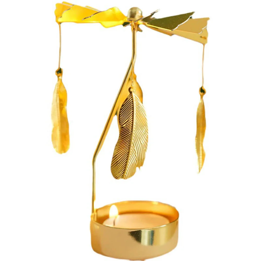 A gold rotating candle holder with a heat-powered spinning carousel for tealights.