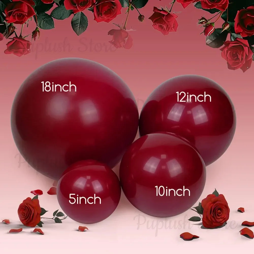 A collection of deep burgundy latex balloons in various sizes, including 5 inch, 10 inch, and 12 inch, arranged against a bac