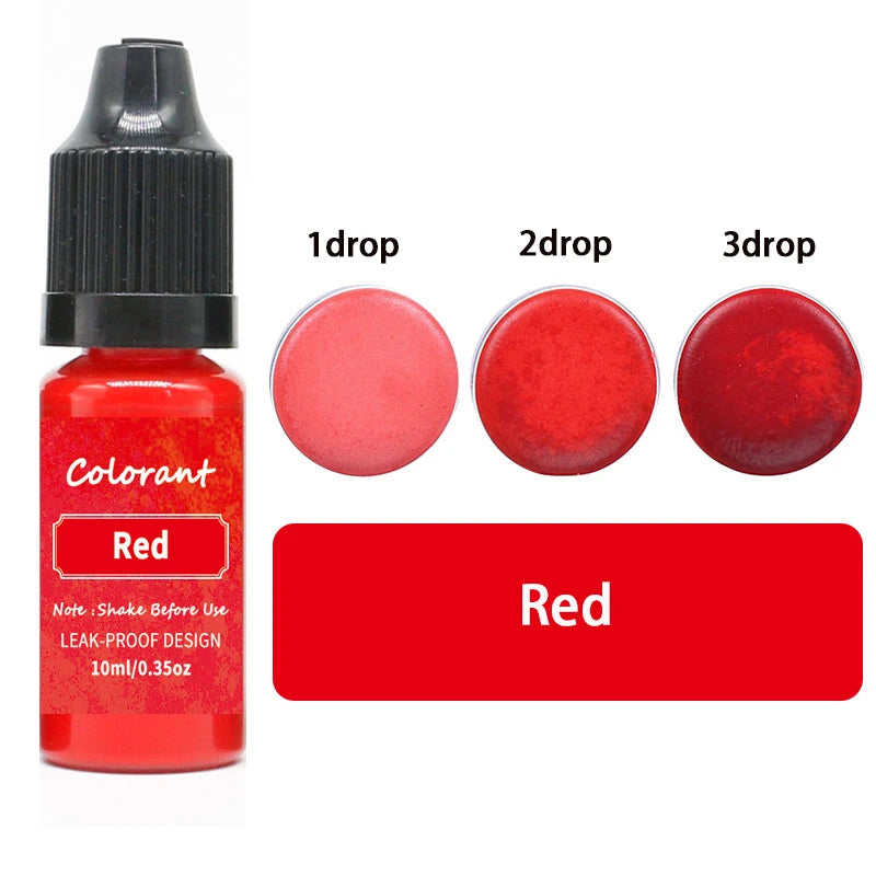 A bottle of red liquid colorant with dropper tips showing 1, 2, and 3 drops of red pigment.