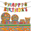A colorful banner with birthday letters and a vibrant floral pattern background.