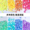 Assortment of colorful resin rhinestones in various shades including yellow, orange, pink, green, blue, and purple.