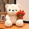 A fluffy white bear plush toy with dark eyes and a bouquet of red roses.