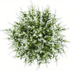 A dense bouquet of artificial white and green foliage used for home decor.