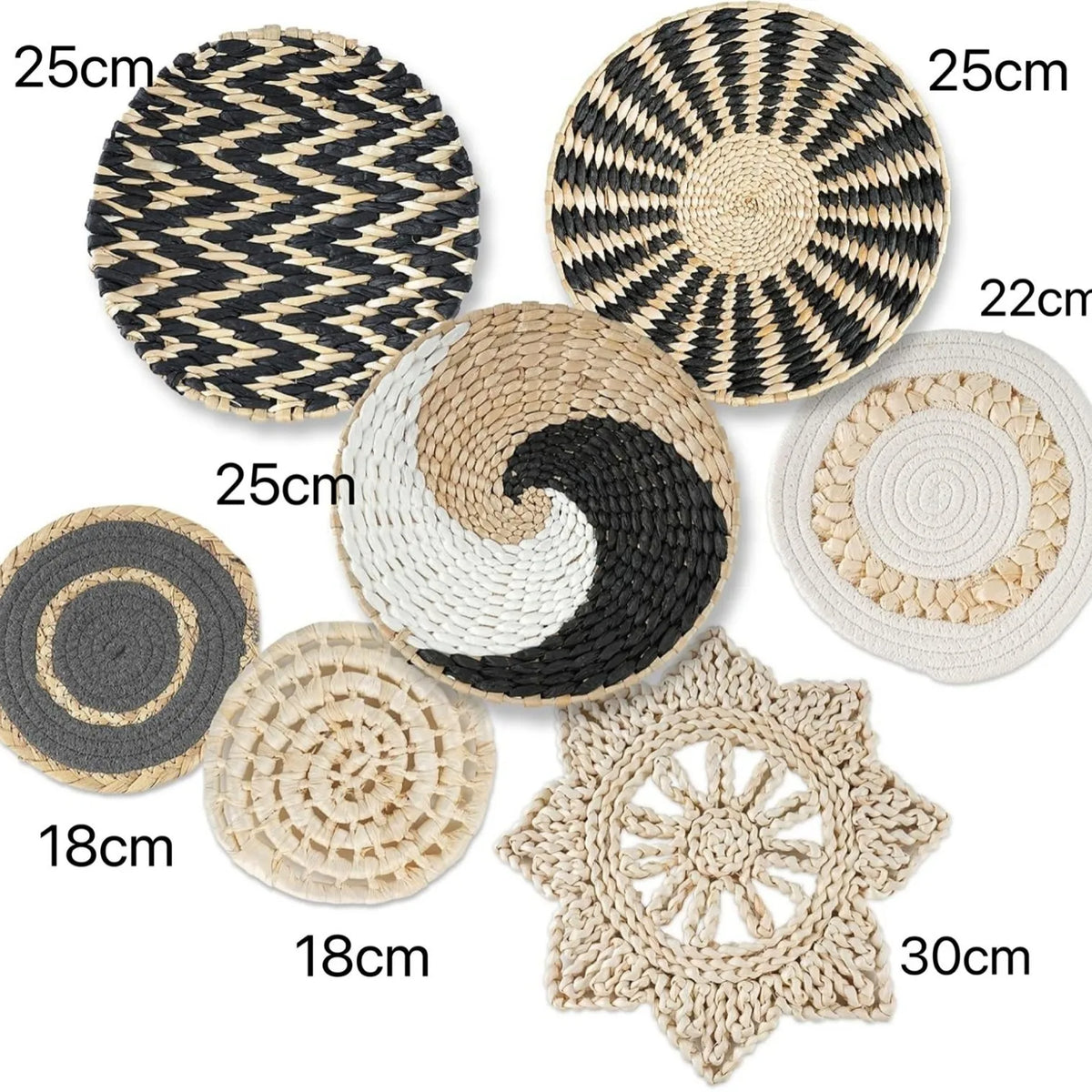 A collection of woven straw wall hangings and decorative circular pieces in various sizes and patterns.