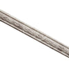 Silver decorative wall trim strips with an embossed scroll pattern.