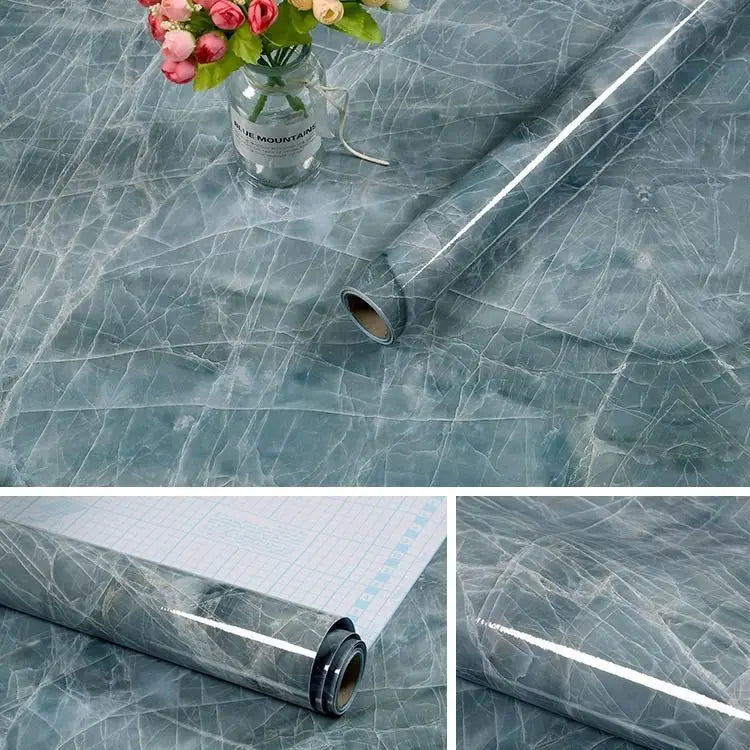 Roll of gray marble contact paper showing a close-up view of the self-adhesive material.