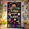 A black classroom door banner decorated with colorful stars, flowers, and the text Bienvenidos de Regres a Clases.