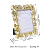 A gold-bordered photo frame featuring a Ginkgo leaf design, suitable for displaying pictures.