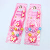 Pink beaded jewelry set for girls featuring butterfly hair clips and colorful beads