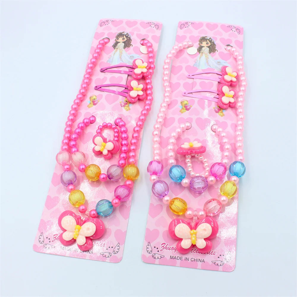 Pink beaded jewelry set for girls featuring butterfly hair clips and colorful beads