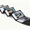 A black accordion folding photo album displaying several photos.