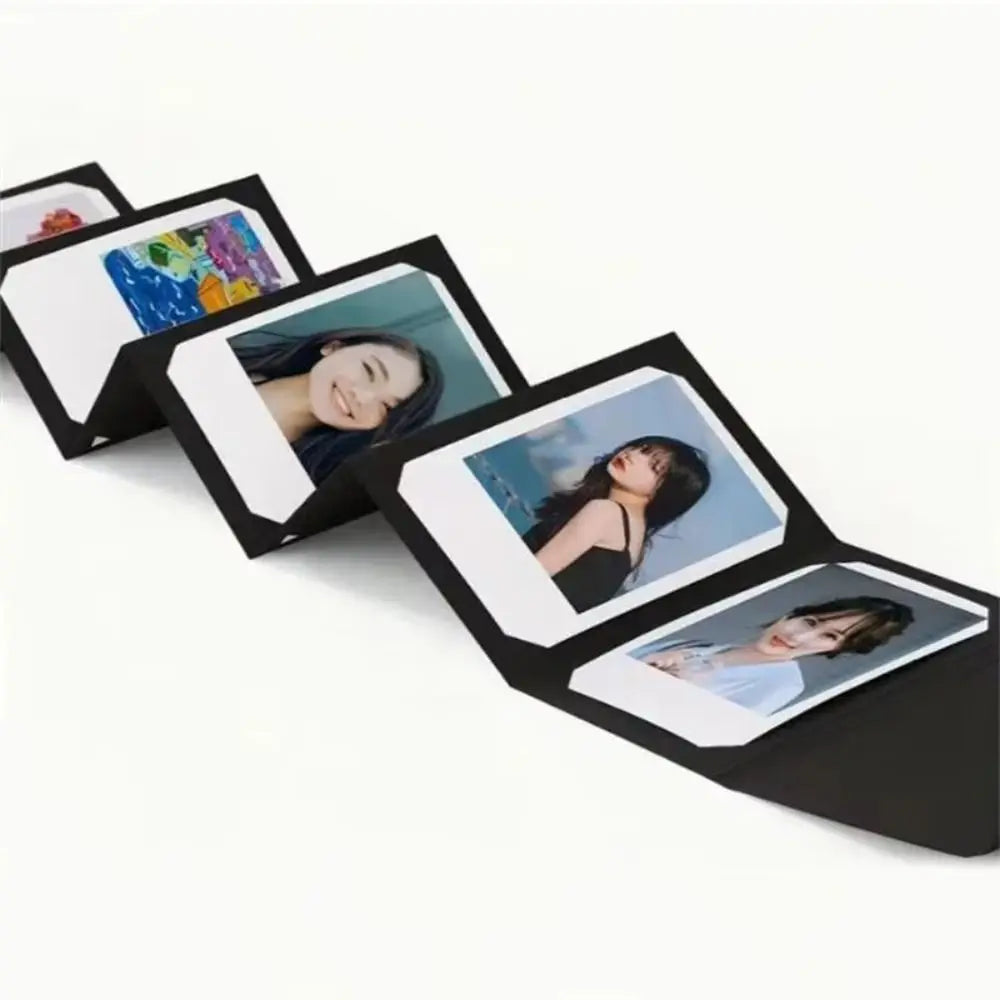 A black accordion folding photo album displaying several photos.