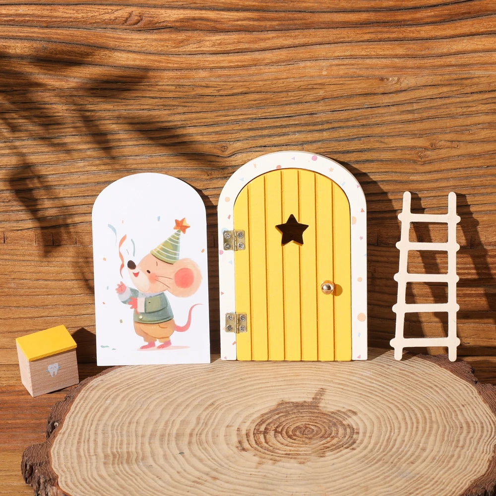 A wooden fairy elf door miniature decoration with a tooth box set against a wooden background.
