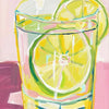 A glass filled with yellow lemon slices and green liquid on a pink background.