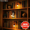 A wooden bookcase filled with books and decorated with a hanging lantern light.