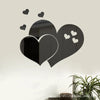 Black acrylic heart wall art decal featuring a large heart shape with smaller hearts floating above it.
