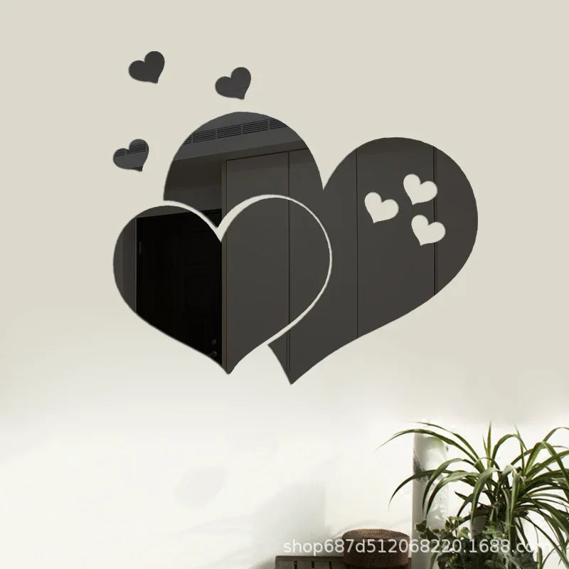 Black acrylic heart wall art decal featuring a large heart shape with smaller hearts floating above it.