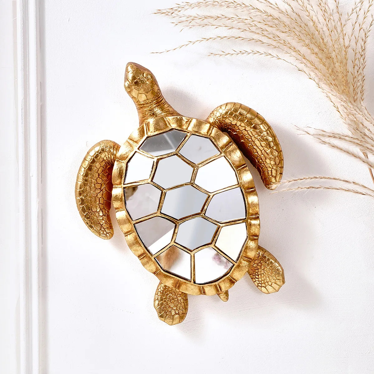 Golden sea turtle resin wall decor mirror with a textured gold frame and shell design